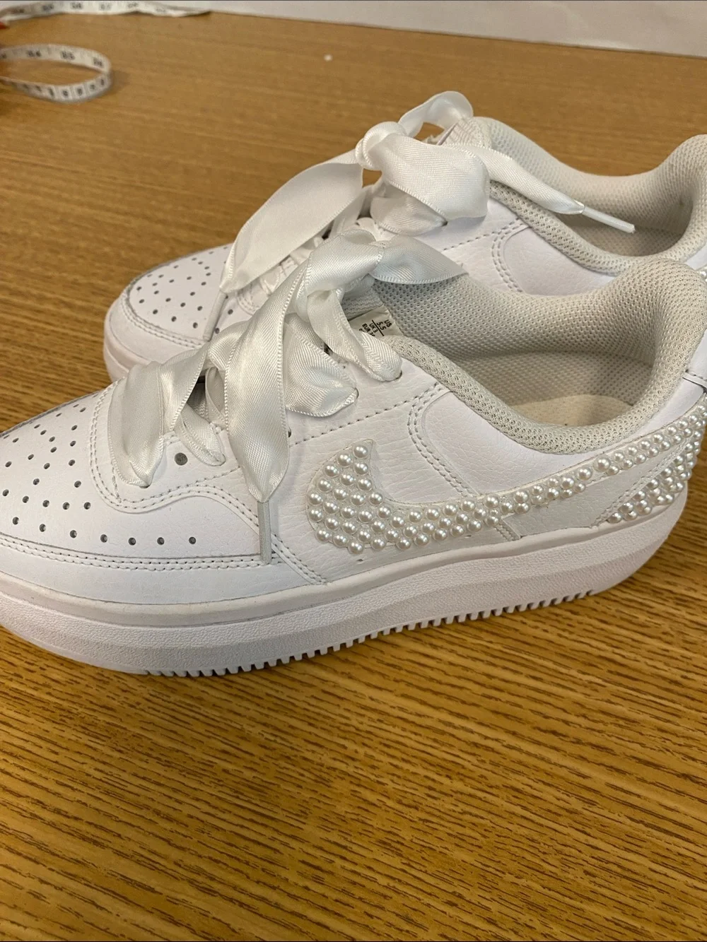 Nike White Platform Sneakers with Pearl Swoosh